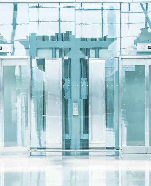 Transparent elevator in underground passage - blue white balance processing